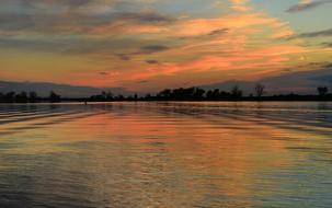 calm wide Measles River at Sunset