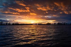 landscape of the lake against the backdrop of a beautiful sunset
