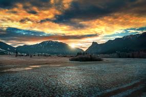 dramatic sky over mountain landscape in winter