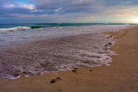 tropical beach in cuba on a cloudy day