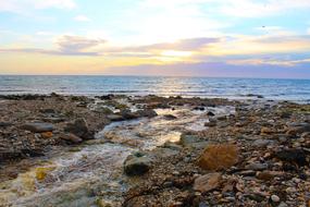 Beautiful landscape with the colorful coast at colorful sunset