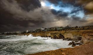 Beautiful shore of Ayia Napa in Cyprus, under colorful, cloudy sky, in Greece