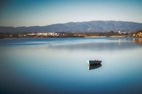 lonely boat in water