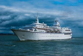 landscape of the cruise ship beneath dramatic clouds