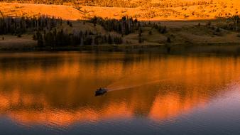 Boat on Lake at Sunset, usa, wyoming, bridger-teton national forest