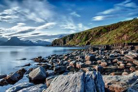big stones on the beach by the lake