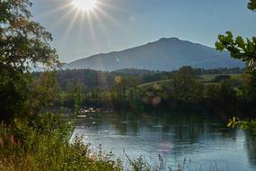 landscape of Sunsetc over the River and Mountain