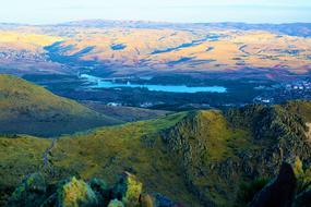 Beautiful and colorful panorama with the lake with dam, among the mountains
