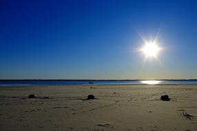 bright evening sun over a sandy bay in Oklahoma