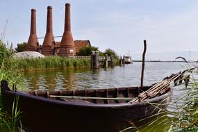 fishing boat on the water among the reeds