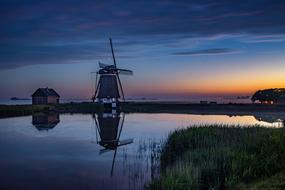 evening photo of a windmill in Holland