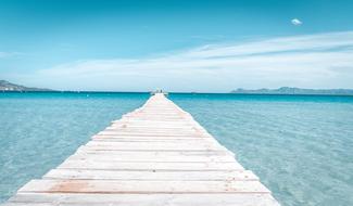 white pier on the sea in Mallorca