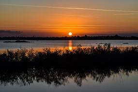 Beautiful colorful gradient sunset on the water