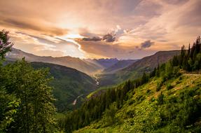clouds over green valleys in the mountains