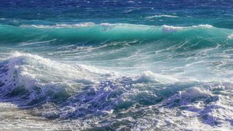 turquoise Surf with white foam on Sea