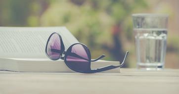 Summer Reading, Sunglasses on open book