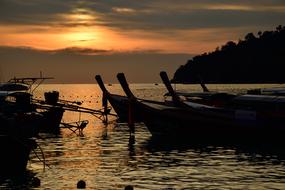 traditional boats anchored on sea at dusk, thailand, Ko Lipe