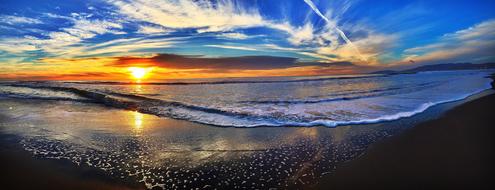 optical panorama of the evening ocean coast