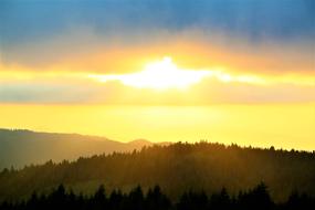 yellow sunset over scenic landscapes