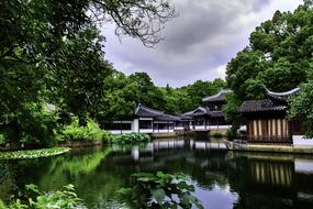 photo of a village by a lake in China