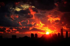 red fiery sunset over buildings in the Republic of Korea