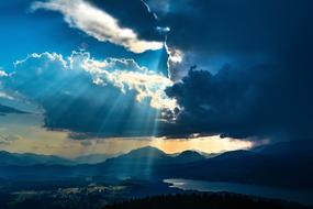 bright rays of the sun through storm clouds