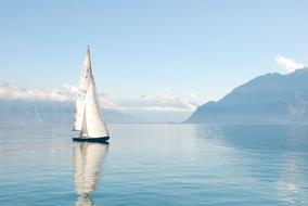 white sailing ship in a lake in Geneva