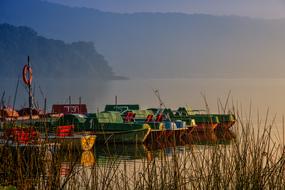 bright fishing boats at the pier on Lake Laach