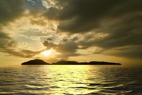 twilight over the sea on the background of the island