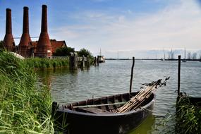 boat with fishing tackle by the lake