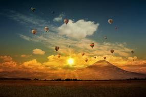 Hot Air Balloons at flight at sunset