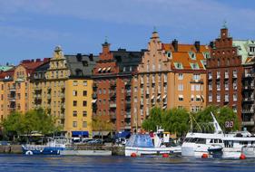 boats near houses in Stockholm