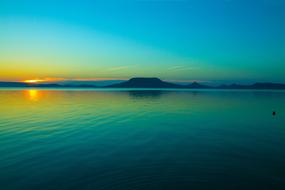 landscape of Body Of Water at Sunset