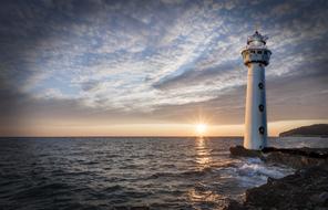 lighthouse glow evening sun