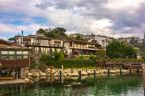 photo of houses along the tourist beach