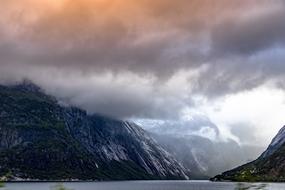 panoramic view of mountains in norway in thick clouds