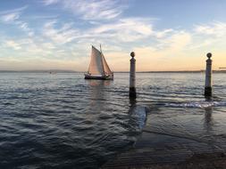 sailboat at sea at sunset in portugal