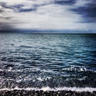 cloudy sky over the sea surf