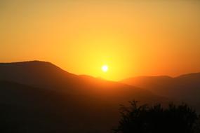 Beautiful and colorful sunset behind the mountains