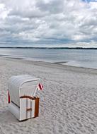 white Chair on Baltic Sea Beach