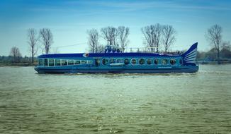 tourist ship sailing on the river Rhine