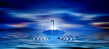 image of an umbrella floating in the sea