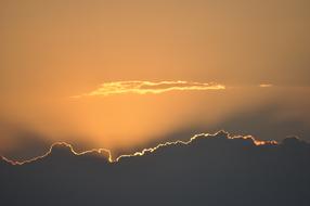 golden sky above the clouds