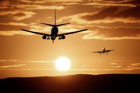 Aircraft Landing sunset