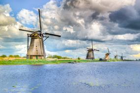 Beautiful and colorful landscape of Kinderdijk with windmills in Netherlands