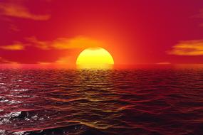Sunset over sea, sun at horizon