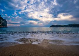 beach in greece at cloudy twilight