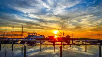 colorful twilight over the boats on the dock