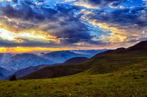 bright cloudy sky over pasture