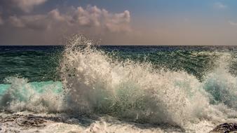 big waves and splashes on the seashore